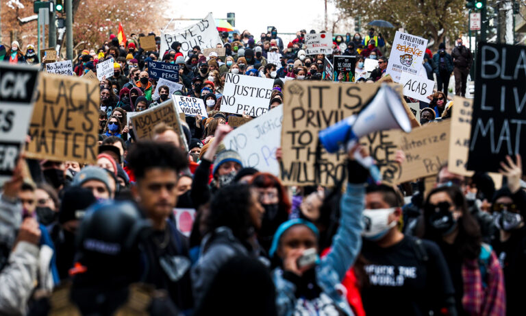 The Pan African World protests in solidarity with Black America against police brutality and racism